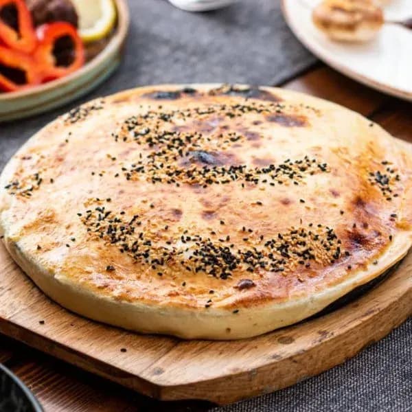 لحمة بالصينية مع طرطور